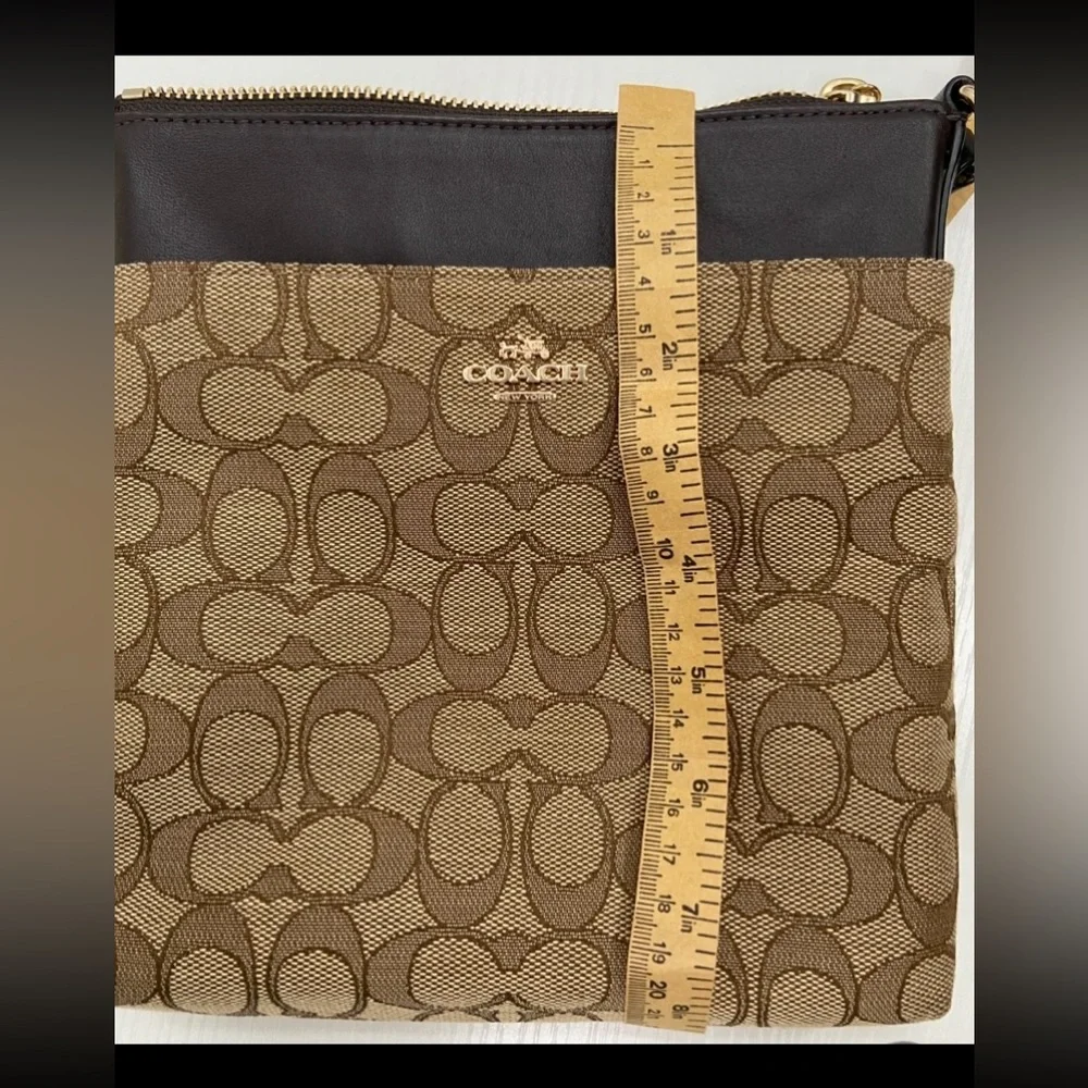 NEW Coach Bag Signature Canvas North South Swing pack 52576‎